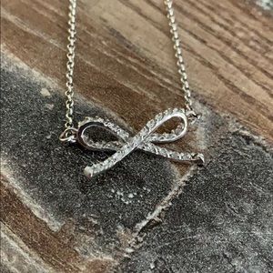 Sterling silver CZ bow necklace